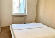 Helle, teilmöblierte Eigentumswohnung mit sonnigem Balkon und Tiefgaragenparkplatz.