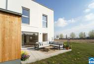 Familienglück im Grünen – nachhaltige Reihenhäuser am Kanal