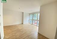 Neuwertige 2-Zimmer-Wohnung mit großer Innenhof-Fensterfront, Balkon und moderner Komplettküche! Nähe Millennium City, Handelskai und Donau. - WOHNTRAUM