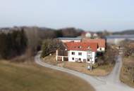 Ein- oder Mehrfamilienhaus samt Nebengebäuden im Bauland-Betriebsgebiet