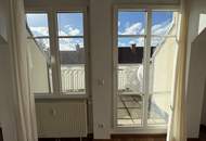 Ruhige 2-Zimmer Wohnung mit Grünblick, Terrasse und 2 Garagenplätzen