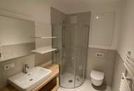 Moderne Neubauwohnung im Zentrum – mit Loggia u. Lift ! TIEFGARAGENPLATZ und KONTROLLIERTE WOHNRAUMBELÜFTUNG