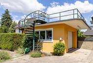 Einfamilienhaus mit Salzwasserpool, Wintergarten, Garage und zwei Carports