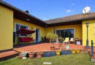 Licht, Luft und Freiheit: Bungalow mit großem 1.622 m2 Garten und Pool