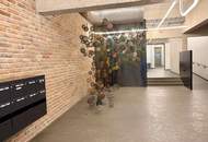 Urbanes Arbeiten im Industrial-Chic: Exklusives Büro mit Open-Space-Flair und Innenhof-Balkon
