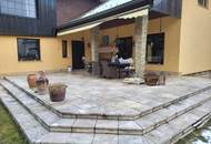 GROSSZÜGIGES EINFAMILIENHAUS MIT TRAUMHAFTEM GARTEN