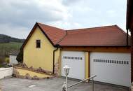 "Charmantes Einfamilienhaus mit Terrasse, Garage und zusätzlichem Grundstück"