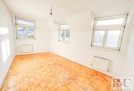 Stilvolle Dachgeschosswohnung in gepflegtem Altbau