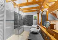 Wohngenuss im Dachgeschoss – Seeblick, Wellnessoase & alpiner Charme vereint