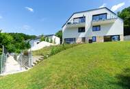 Design trifft Natur: stylische Garten-Maisonettewohnung mit traumhafter Aussicht