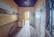 Sanierungsbedürftige gut aufgeteilte 2 Zimmer Wohnung