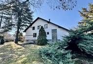 GROßZÜGIGES ZWEIFAMILIENHAUS MIT 1.548 m² TRAUMGARTEN IN ABSOLUTER GRÜNLAGE