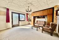 GROßZÜGIGES ZWEIFAMILIENHAUS MIT 1.548 m² TRAUMGARTEN IN ZENTRALER GRÜNLAGE