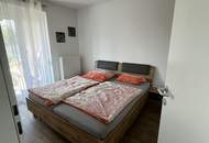 SELTENE GELEGENHEIT AUF EINE NEUWERTIGE GARTENWOHNUNG IN RUHIGER, BESTER WOHNLAGE IM HERZEN VON ABSDORF MIT DIREKTER BAHNANBINDUNG