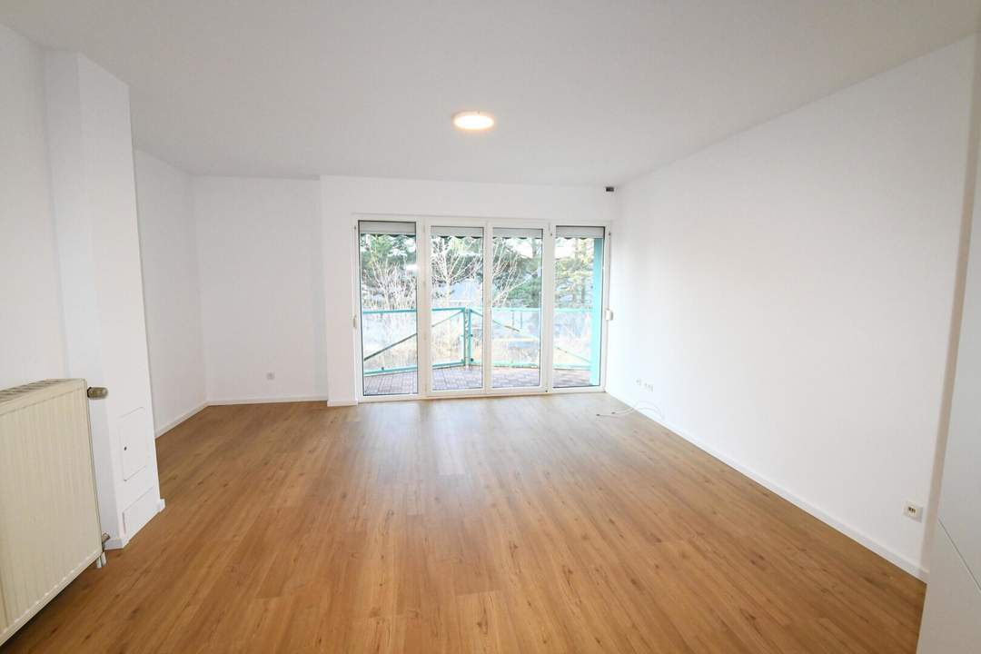 2 Zimmer Wohnung mit Balkon, Gartennutzung & Autoabstellplatz in Ruhelage