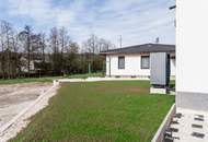 Gartenidylle in Bruckmühl: Moderne 3-Zimmer-Wohnung mit Terrasse