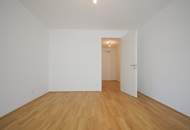 BALKONWOHNUNG IM INNENHOF - 2-ZIMMER IM ERSTBEZUG