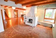 Einfamilienhaus in zentraler Bestlage mit Tennisplatz auf parkähnlichem Grund!