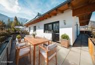 Lichtdurchflutete Dachwohnung mit Terrasse und privatem Garten