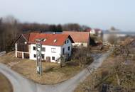 Ein- oder Mehrfamilienhaus samt Nebengebäuden im Bauland-Betriebsgebiet