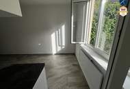 Wohnküche mit Gartenblick + Zimmer