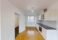 Moderne Erdgeschosswohnung mit Freifläche in zentraler Lage!