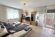 Neuwertig. Komfortabel. Mit Balkon. Mit privatem Patio. Im Zentrum.