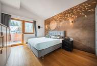 Lichtdurchflutete Dachwohnung mit Terrasse und privatem Garten