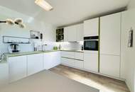 Familienfreundliche 4-Zimmer-Wohnung mit Tiefgaragenabstellplatz, Loggia, Gartenanlage & nachhaltiger Heizung