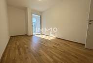 Lichtdurchfluteter Erstbezug: 3-Zimmer mit Loggia und Weitblick in top Lage!