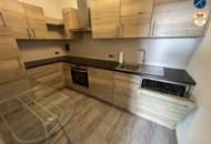 Neuwertige 2-Zimmer Wohnung mit 2 Loggien und Auto-Stellplatz