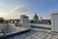 Helle Dachgeschosswohnung mit Terrassen und Blick auf die Karlskirche