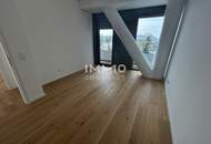 Großzügige 4 Zimmer Wohnung mit über 100 m² Balkon und Blick auf die Donau!