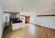 3-Zimmer-Neubauwohnung mit Westbalkon & Garage in ruhiger Grünlage
