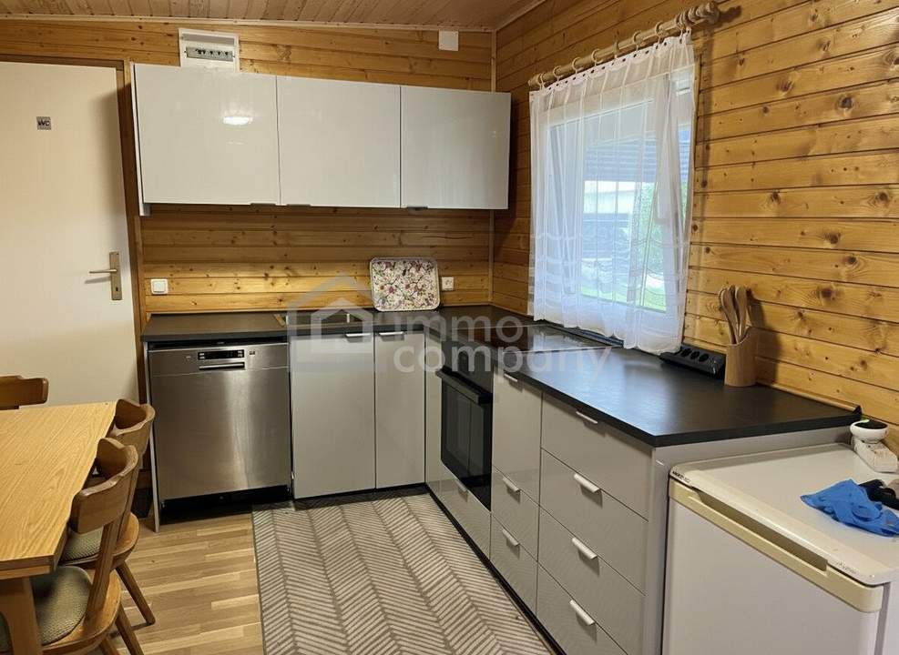 Charmantes Ferienhaus mit Seezugang am Neufelder See – ganzjährig bewohnbar
