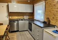 Charmantes Ferienhaus mit Seezugang am Neufelder See – ganzjährig bewohnbar