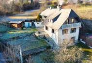 Haus mit zwei Wohneinheiten und Gartenidylle