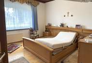 Unterkellertes Einfamilienhaus mit Garage und Obstbaumbestand