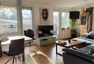 Mauer "Licht. Ruhe. Effizienz. Stilvolle Maisonette mit Südterrasse" | ZELLMANN IMMOBILIEN