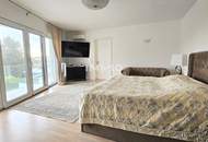 Zeitlose Architektur trifft Großzügigkeit - Designvilla mit Indoor-Pool und Einliegeroption