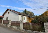 Einfamilienhaus mit großzügigem Garten in Siedlungsrandlage