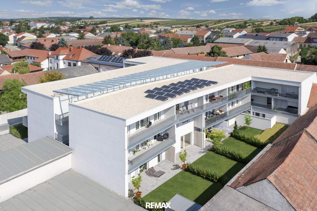 Neuwertige Familien Wohnung inkl. Tiefgaragenparkplatz