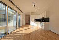 Schicke Neubauwohnung mit kl. Garten in idyllischer Ruhelage