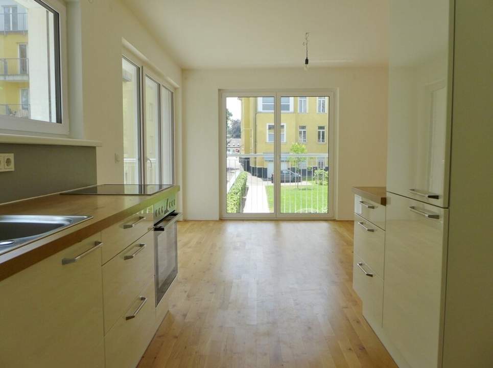 Sonnige und freundliche Neubauwohnung – 3 Zimmer mit Balkon und Gartenmitbenützung!