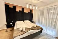 REDUZIERT! Sofort Bezugsfertig in Bestlage! Traumhafte Dachgeschosswohnung mit Loggia und Panoramafenster ++ Weitblick über Wien ++ Komplett Eingerichtet ++ Dachgeschossneubau aus 2021 ++ Auch für Anleger!!!