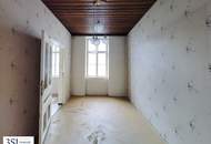 Familienfreundlicher Altbau mit Potenzial – großzügige 4-Zimmer-Wohnung mit Balkon in zentraler Lage