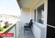 3-Zimmer-Wohnung mit Potenzial – Im sanierten Gebäude, mit Loggia, Garten und Stellplatz