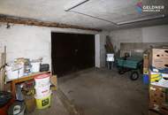 Solides Einfamilienhaus mit 3 Zimmer, Terrasse, großer Garten und 2 Garagen und Nebengebäude