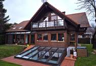 BEGEHRTE WOHNLAGE AM MÜHLWASSER: HOCHWERTIGES WOHNJUWEL ALS EINFAMILIENHAUS IN AUSGEZEICHNETER, SEHR RUHIGER WOHNLAGE MIT HALLENBALD, SAUNA UND FITNESSRAUM