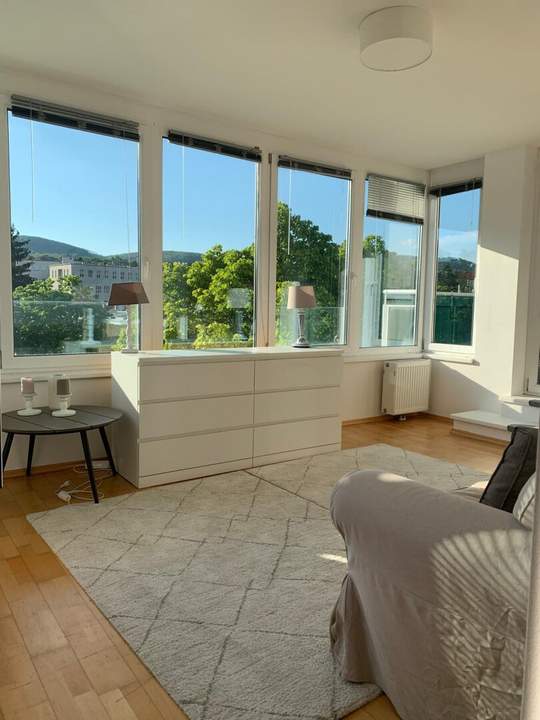 1190! Entzückendes, voll möbliertes DG mit zwei Terrassen und Tiefgaragenplatz!